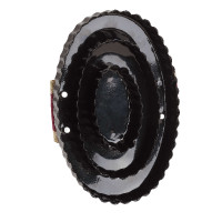 Metallischer ovaler Striegel